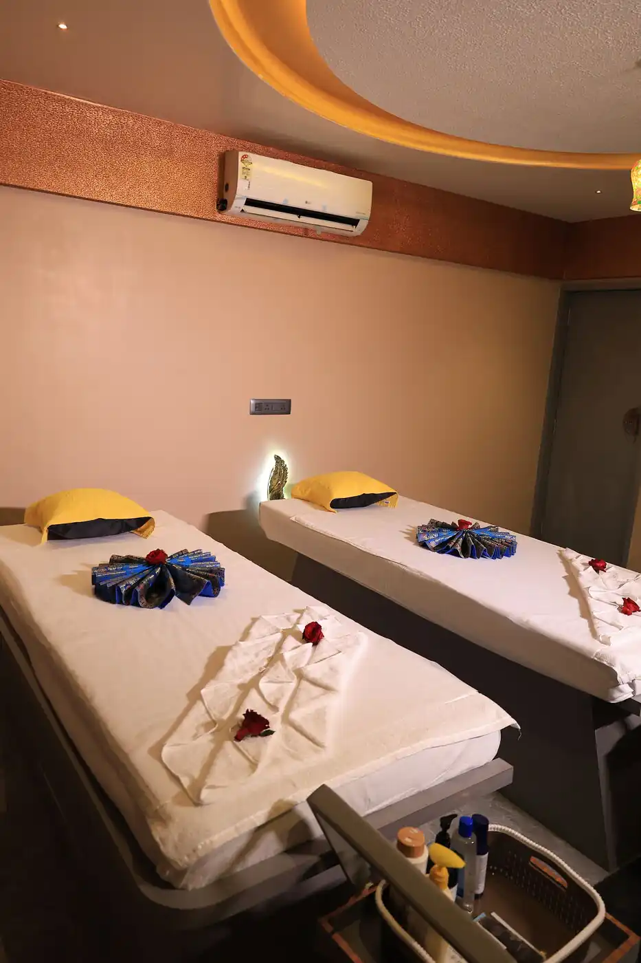 Twin massage beds side by side in couple treatment room